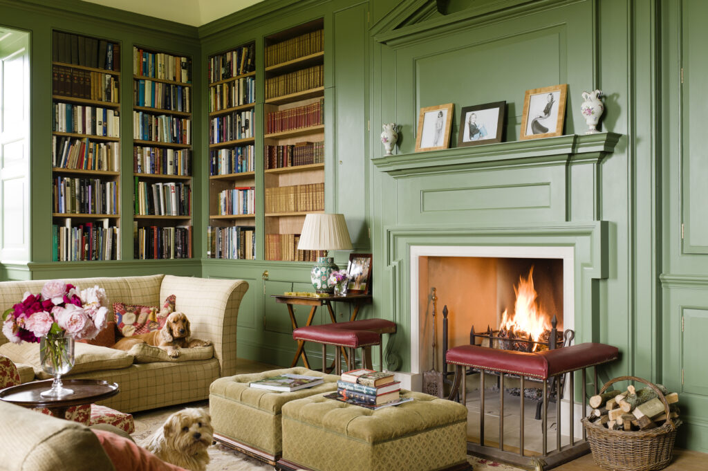 A countryside designed living room with a fireplace.